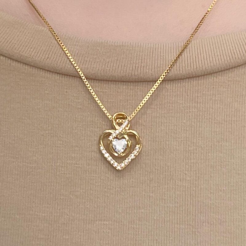 Colar Coração Vazado com Ponto de luz Banhado em Ouro 18k