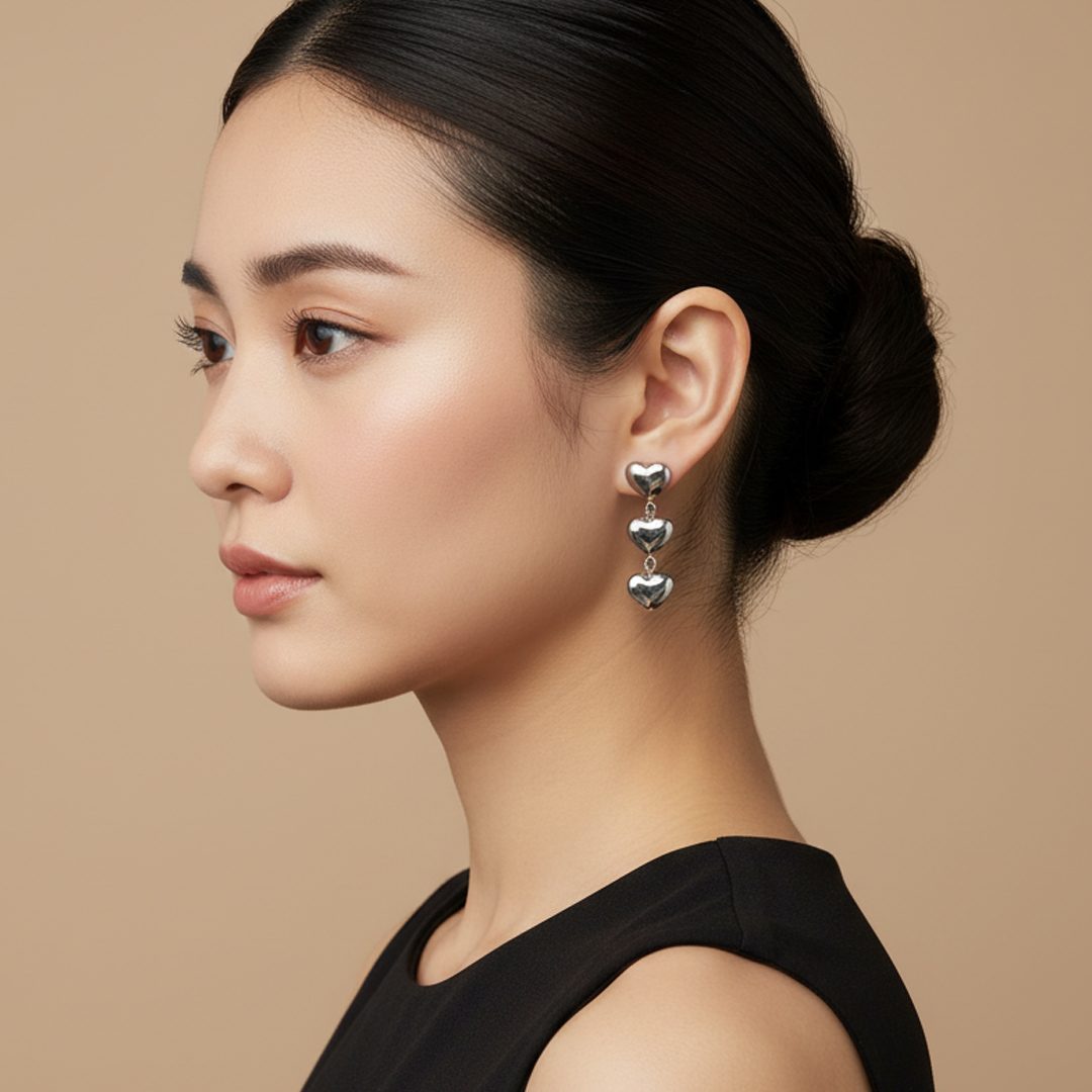 Brinco Pêndulo Corações em Aço