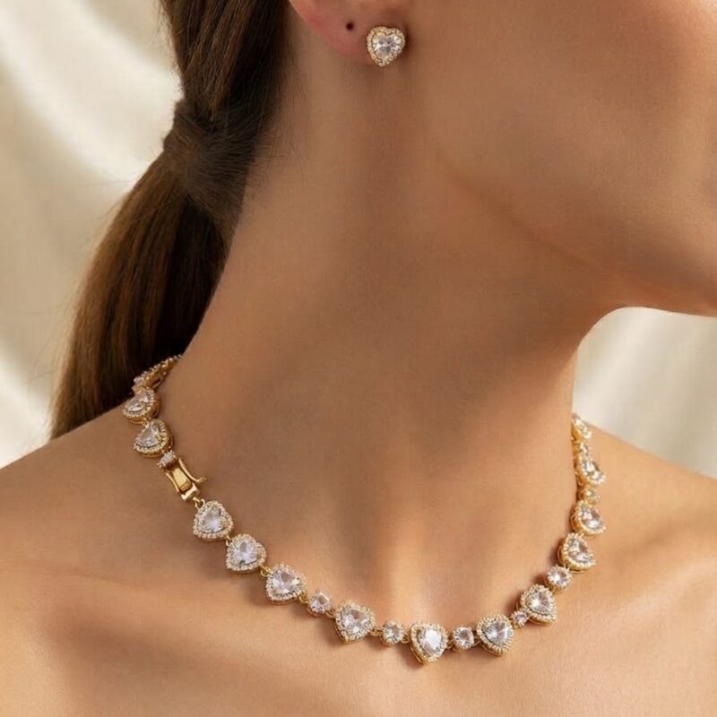 Conjunto coração e esfera cravejados banhado em ouro 18k premium