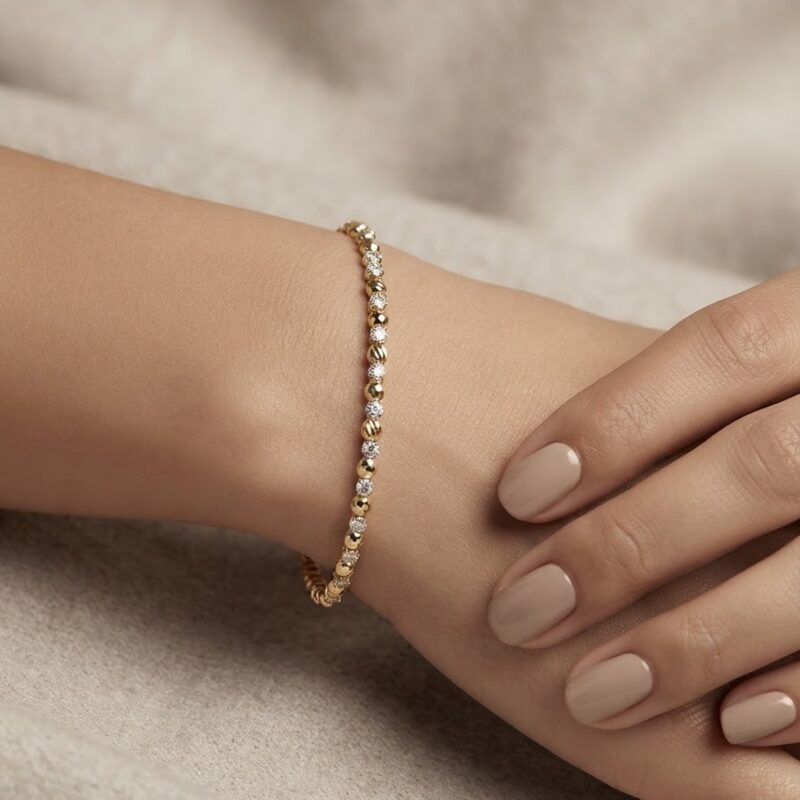 Bracelete regulável com esferas trabalhadas em ouro 18k, coleção Riviera